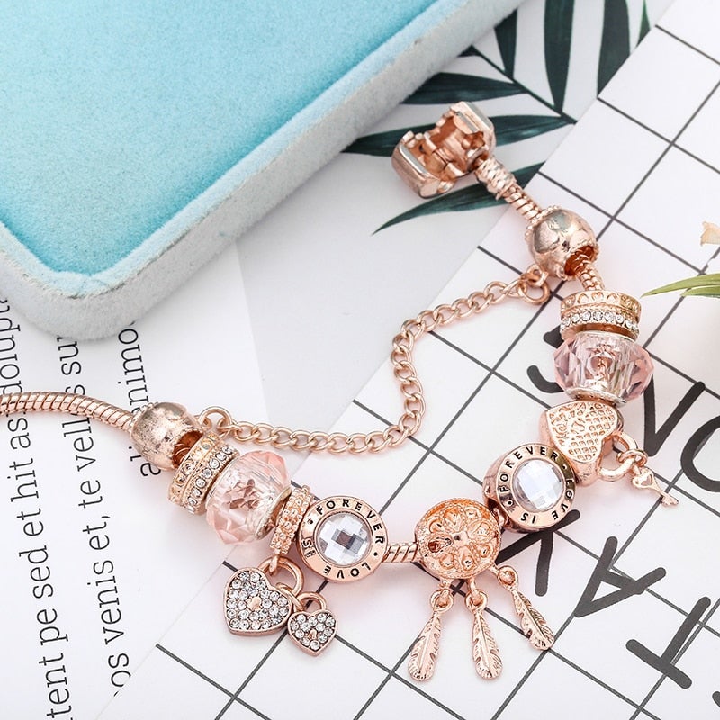 VEYLINIA | Elegant snörosarmband med silverhängen