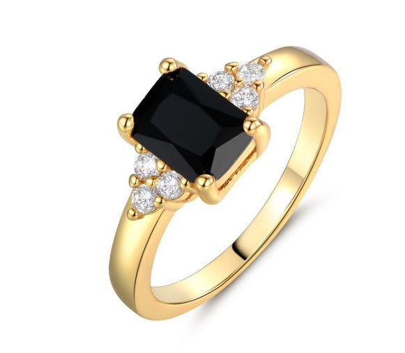 VEYLINIA | Sort spinell-baguette-ring i guld