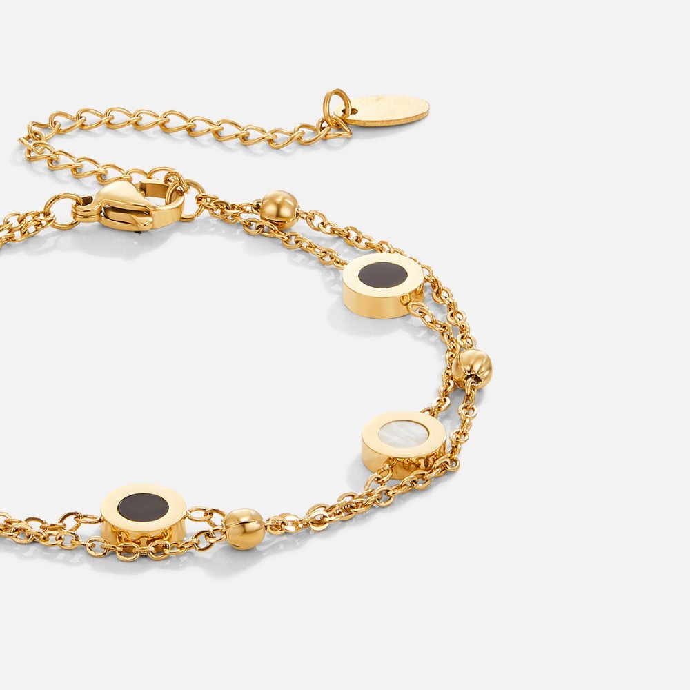 VEYLINIA | Onyx & Vit Mineralarmband
