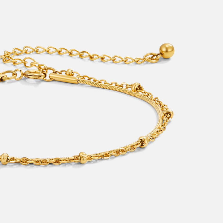 VEYLINIA | Lagerarmband i Guldton